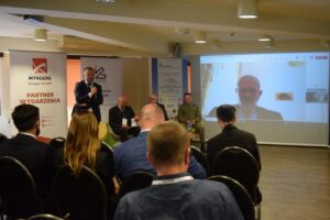 Sala konferencyjna podczas panelu ekspertów.